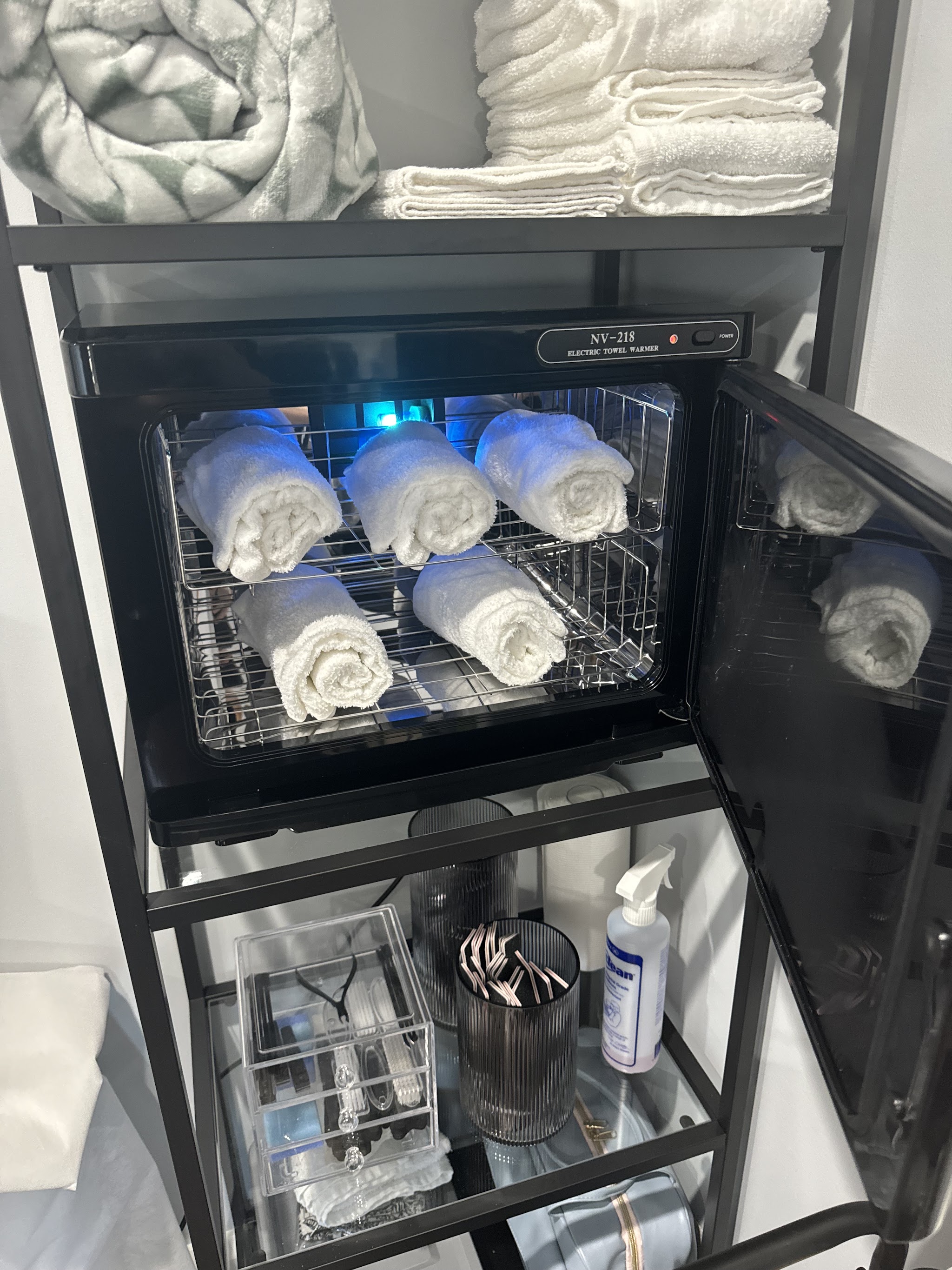 Sterilised tools and rolled towels in the treatment room