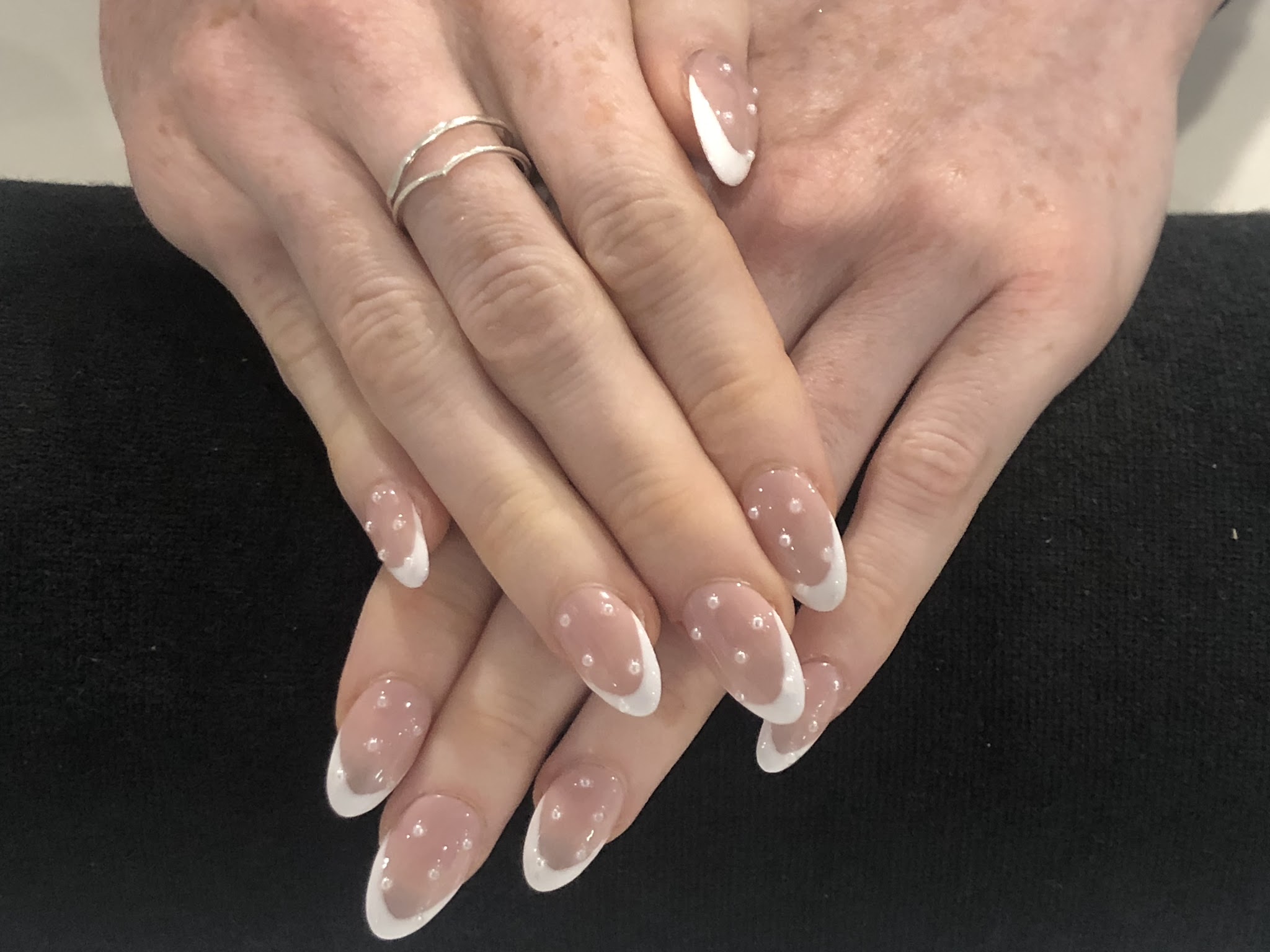 French tip nails finished in the room